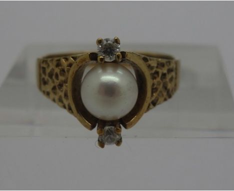 A 9ct gold, pearl and white stone ring, weight 3.4g, size N