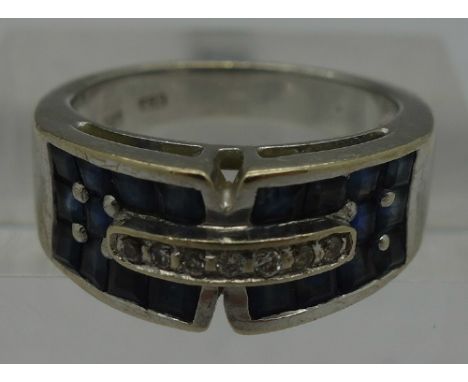 A 14ct gold, diamond and sapphire ring, weight 7.4g, size O