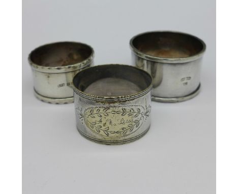 A silver napkin ring and two plated napkin rings, weight of silver 37g