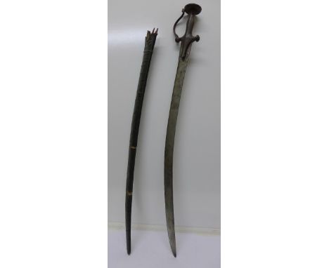 A Punjabi Tulwar with scabbard, length of sword 85cm