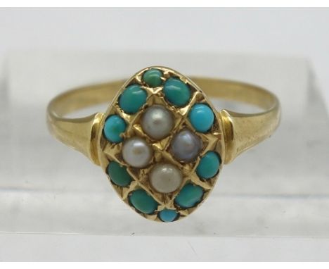 An 18ct gold ring set with turquoise and seed pearls, weight 2.3g, size P