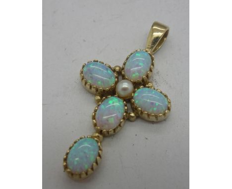 A 9ct gold and synthetic opal cross pendant, weight 3.2g