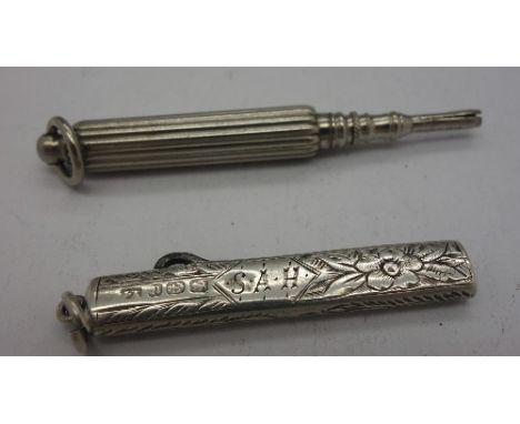 A pencil and a Victorian silver button hook
