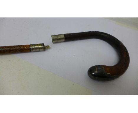 A silver mounted bamboo sword stick