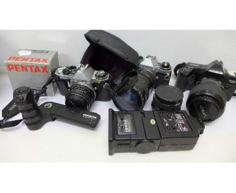 Cameras and accessories including a Pentax ME Super and MEF, various lenses, film, and a Minolta Dynax 3000i camera
