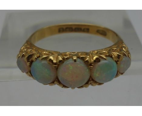 An 18ct gold and opal ring, Birmingham 1899, weight 5g, size N