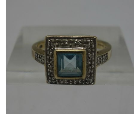 A 9ct gold, diamond and blue stone ring, weight 3g, size K