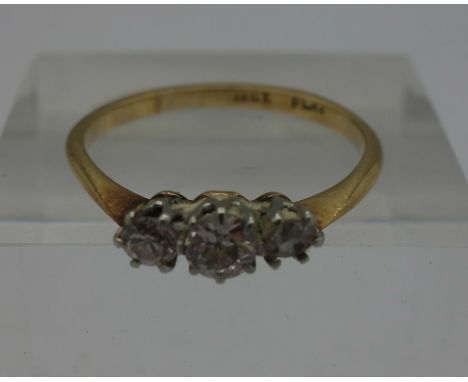 An 18ct gold, three stone diamond ring, weight 2.1g, size P