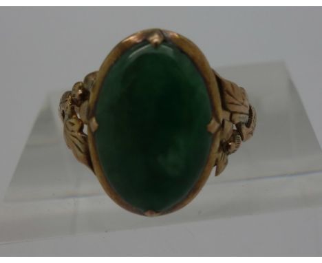 A 14ct gold and jade ring, weight 2.6g, size K