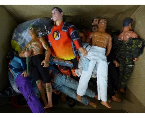 Fourteen Action Man figures and accessories and one other action figure