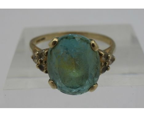 A 9ct gold and blue stone ring, weight 3.4g, size P