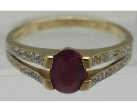 A 9ct gold, ruby and diamond ring, weight 2.5g, size P
