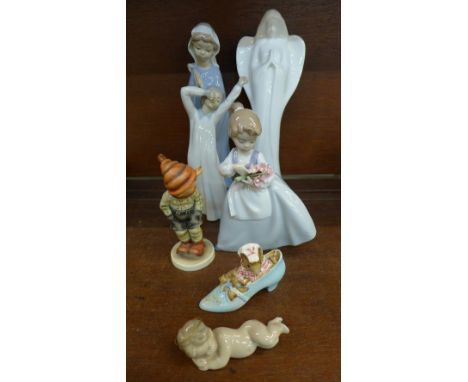 A collection of figures including three Nao, Doulton, a Lladro angel, a/f, etc.