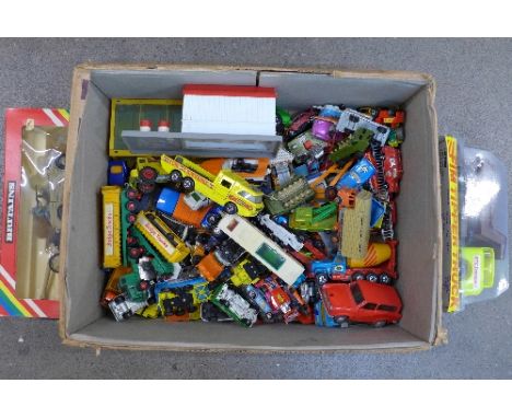 A collection of model vehicles including a boxed Britains, 9788, Kubelwagen & Field Gun