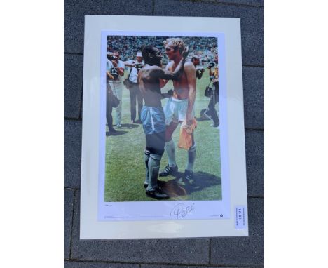 Pele Signed Mounted Brazil Football Print: Hand signed by Pele who is pictured with Bobby Moore exchanging shirts after the 1