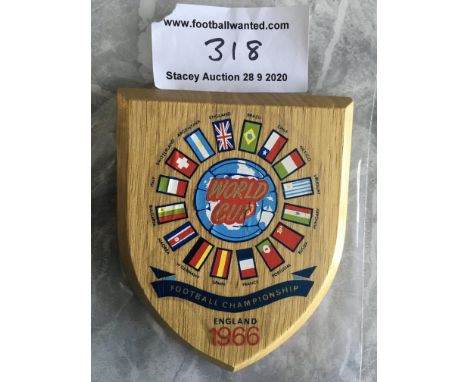 1966 World Cup Wooden Football Plaque: Small original plaque has flags of all participating countries with England 1966 Under