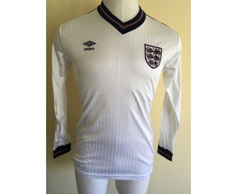 1985 Ray Wilkins Match Worn England Football Shirt: Long sleeve white Umbro number 8 shirt. Worn in the match v Republic of I