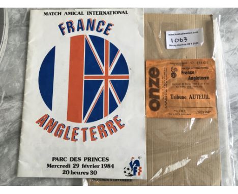 1984 France v England Signed Programme + Ticket: Signed on team page by England players Sansom Barnes Butcher Bryan + Bobby R