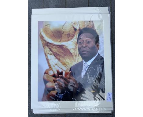 Pele Signed Mounted World Cup Football Print: Hand signed by Pele who is pictured with the World Cup in the background. Mount