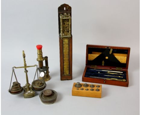 Miniature Japanese Shaku Dokei or Pillar Clock, microscope, letter scales, weights and draftsman's instruments.     