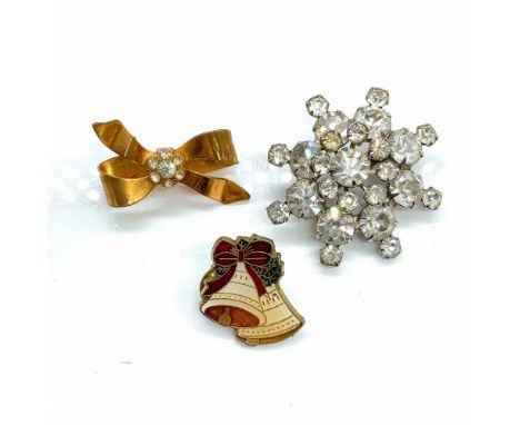 Gold tone bow with rhinestone flower: 1"L x 1.5"W. Holiday bells: 1"L x 1"W. Rhinestone snowflake: 1.5"L x 1.75"W. Condition: