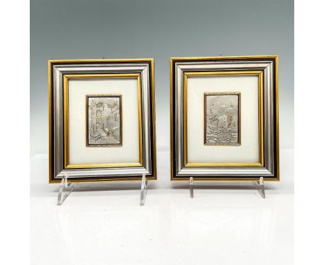 Sterling silver reliefs with gold flake details showing an ancient cobblestone alleyway and a clouded landscape with castle r