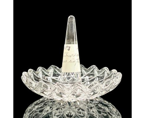 Clear glass ring holder dish with pleasant floral like pattern. Dimensions: 2.75"H x 3.25"diaCondition: Age related wear.