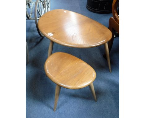 ERCOL: TWO "PEBBLE" TABLES, the largest, 65 cm wide