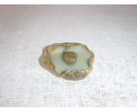 A CHINESE HETIAN JADE BRUSH WASHER in the form of a lotus blossom and decorated with a bat and a dragonfly