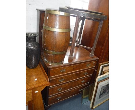 AN EDWARDIAN OAK BRASS BOUND STICK-STAND of barrel form, a mahogany cupboard, a brass top folding table and an Indian brass t