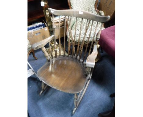 A VINTAGE "STOE" STICK BACK ROCKING CHAIR, made in Yugoslavia