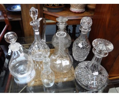 A GEORGE III CUT GLASS DECANTER and similar decanters