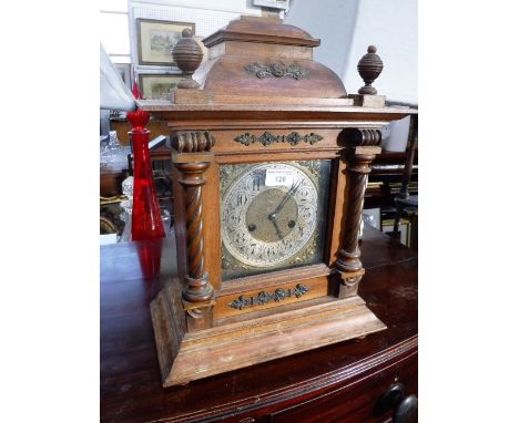 A VICTORIAN WALNUT BRACKET CLOCK with a brass and silvered face, 44 cm high