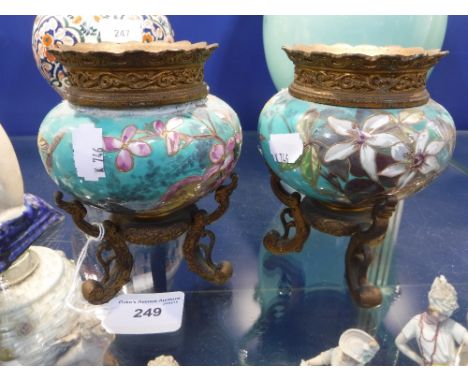A PAIR OF CONTINENTAL GILT METAL AND CERAMIC URNS, 14cm high