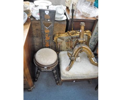 A CARVED WALNUT "X" FRAME STOOL, a Victorian gilt fire screen (examine) a spinning chair and a footstool