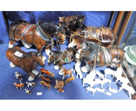 A MELBA WARE CERAMIC SHIRE HORSE, others similar, a collection of blanc-de-chine horses and others similar