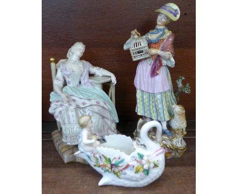A Meissen figure of a girl holding a cage with a lamb at her feet, a/f, a Meissen figure of a girl sleeping, a/f and a contin
