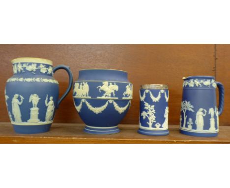 Two Wedgwood dark blue Jasper jugs, an Adams vase and an Adams cylindrical vase with silver rim (4), one jug a/f