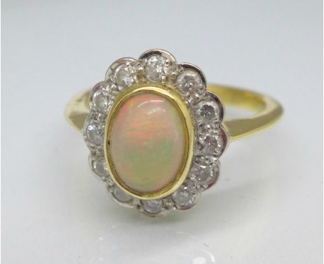 An 18ct gold, opal and diamond ring, 5.5g, M