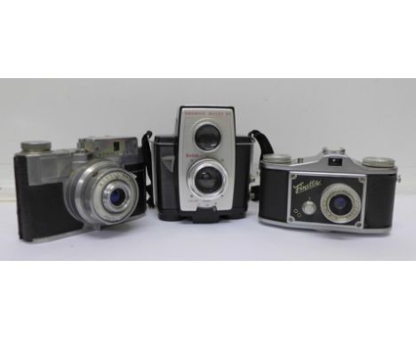 A Brownie Reflex 20 camera and two other cameras, (3)