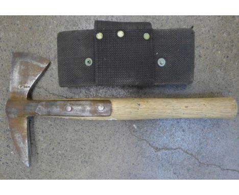 A military issue axe, marked H98, 1955, Elwell, 5122