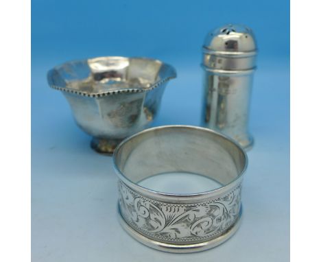 A silver napkin ring by Charles Horner, a silver pepper pot and a white metal salt (3)