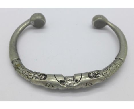 A Scandinavian Viking style pewter torque bangle