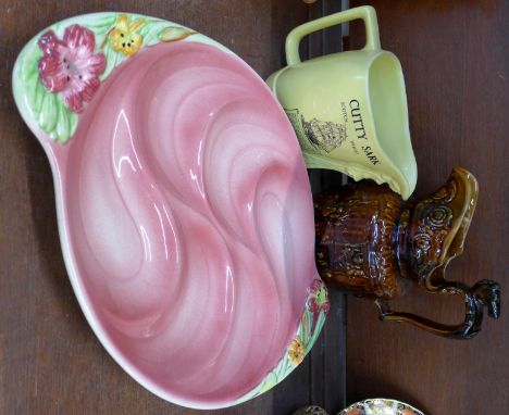 A Cutty Sark Scotch Whisky water jug, a Sadler treacle glaze jug and a Staffordshire nut dish