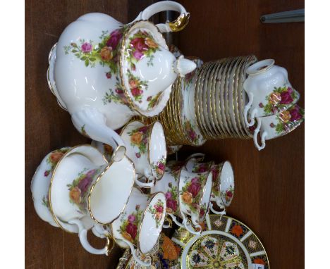 A Royal Albert Old Country Roses twelve setting tea service with six medium plates, forty-five pieces in total, one saucer a/