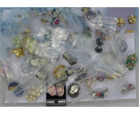 Fifty pairs of vintage clip-on earrings
