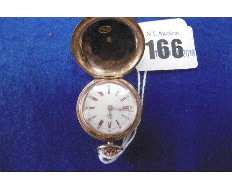 A SWISS ROSE METAL MARKED 14K ENGINE TURNED LADIES HUNTER POCKET WATCH