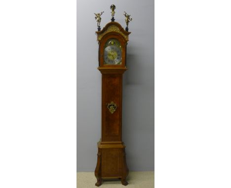 A small Dutch burr walnut cased longcase clock
The brass dial with silvered chapter ring with Roman and Arabic numerals, belo