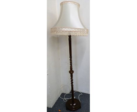Wood standard lamp with cream frilled shade