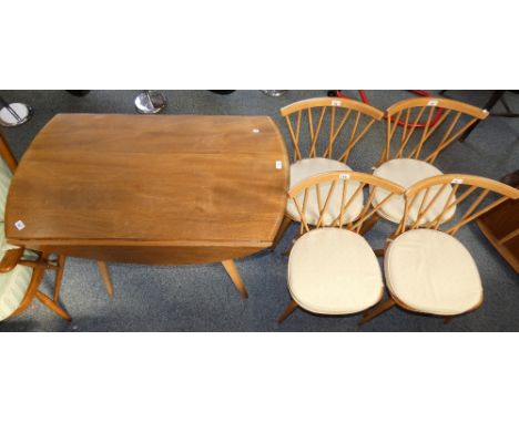 A set of four Ercol light elm and beech stick and rail back dining chairs, raised on turned legs, united by an H framed stret